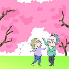 桜の木の下で楽しむ家族