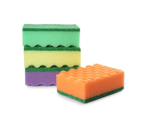 Bright cleaning sponges with abrasive scourers on white background