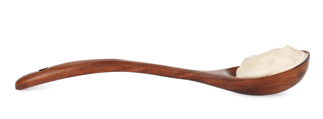 Wooden spoon with tasty mayonnaise isolated on white