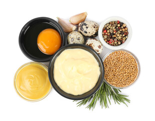 Delicious homemade mayonnaise, spices and ingredients on white background, top view