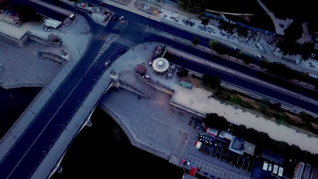 Aerial facing Eiffel tower and trocad&eacute;ro, climbing vertically above Iena bridge