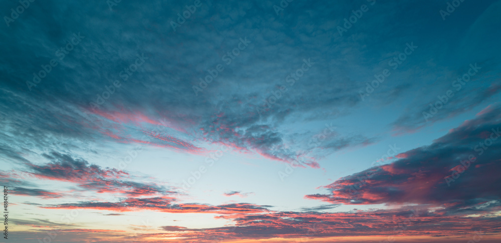 Sticker sunset sky with clouds background