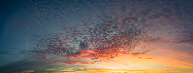 Panorama blue sky and clouds with sunset natural background.