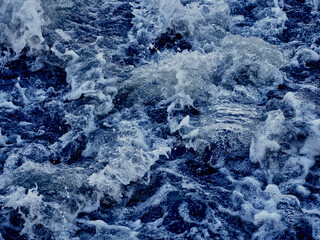 Rapidly flowing water in the river