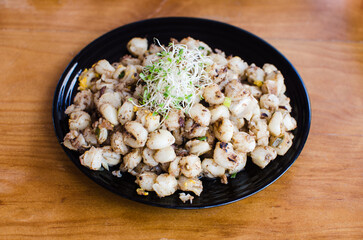 A plate of traditional ecuadorian corn food, mote sucio, showcasing authentic flavors and cultural heritage.