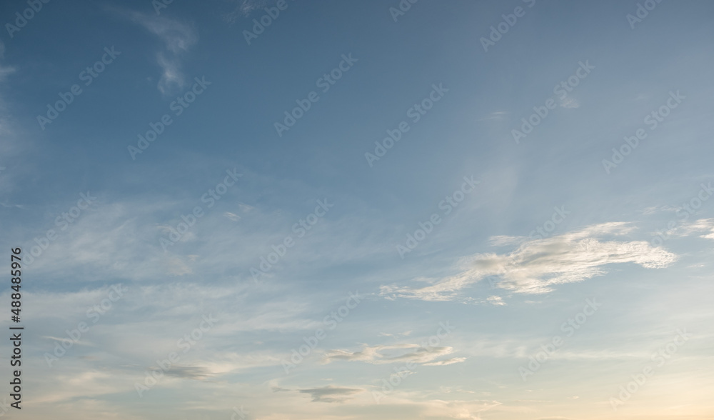 Poster many small clouds in blue sky.summer cloudy.white clouds floating in the sky.