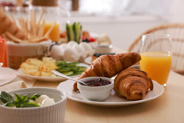 Dishes with different food on table in room. Luxury brunch