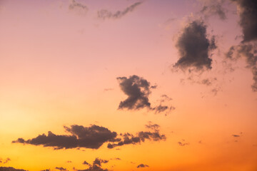 Colorful sunset and sunrise with clouds. Blue and orange color of nature. Many white clouds in the blue sky. The weather is clear today. sunset in the clouds. The sky is twilight