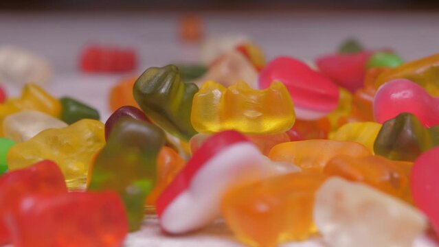 sweet colorful candy gummy falling slow motion 4k