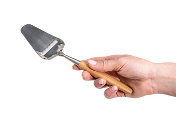 hand holding a hard cheese knife isolated
