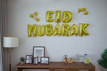 eid mubarak decoration on the wall at home