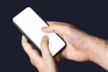 Hand holding a phone with empty white screen on black background