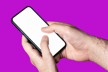 Hand holding a phone with empty white screen on purple background