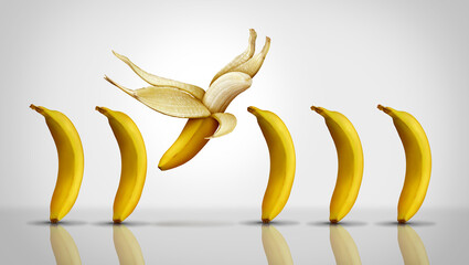 Inspiration and motivation concept as a group of generic bananas with one individual banana flying...