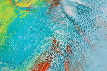 Strokes of colorful acrylic paints on canvas, closeup