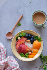 Healthy festive snacks and desserts. Mixed Fruits Muesli Bowl with Olives Cheese and Crackers. Great with health benefits, ideal for between meals snack and breakfast.