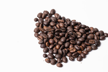 Close-up Roasted coffee beans on white background.