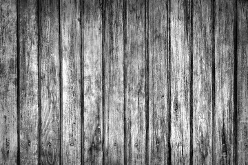 Wooden textured background. Black and white surface of an old wall.