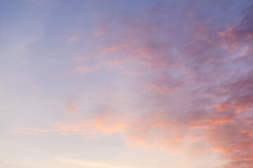 Naklejka na ściany i meble Colorful pink clouds in the sky at sunrise or sunset. Natural natural background.