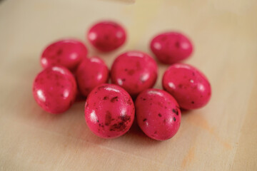 round marshmallows in red color. like eggs. candies. 