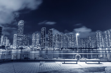 Seaside Promenade and skyline of Harbor in Hong Kong city at night