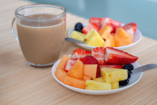 Colorful, ripe, delicious fruits on table and Coffee, breakfast, morning