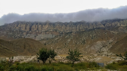 fog in the rural mountainous area of Dagestan with a view of the mountain peaks