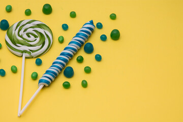 colorful spiral lollipop on background