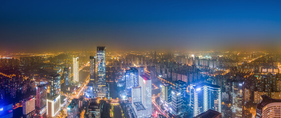 Obraz premium Aerial photography night view of Suzhou East Lake International Financial Center