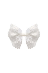 Detailed shot of a hair clip decorated with a white lace bow with a floral design. The fancy hair accessory is isolated on the white backdrop. 