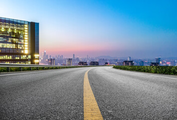 Road and Chinese modern city buildings background