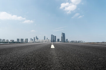 Fototapeta premium Road and Chinese modern city buildings background