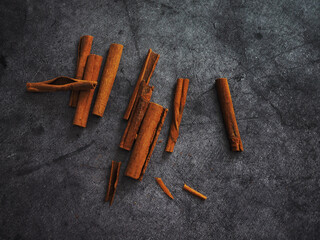 Cinnamon sticks on a dark background