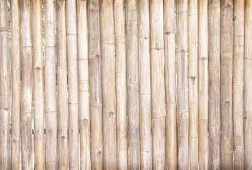 Bamboo wood fence texture with seamless vertical patterns light brown background