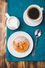 Cake with coffee and cream.