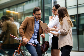 Business people and corporate concept. Portrait of group of business people talking in the city