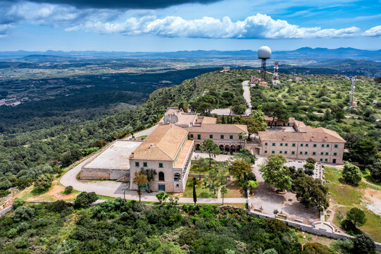 Spain, Mallorca, Helicopter view of Sanctuary of Cura situated on summit of Puig de Randa in summer