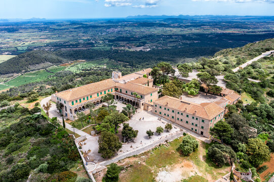 Spain, Mallorca, Helicopter view of Sanctuary of Cura situated on summit of Puig de Randa in summer
