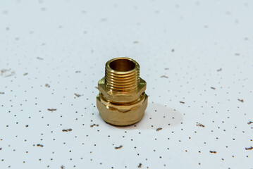 Plumbing fittings for water pipe on white textured background