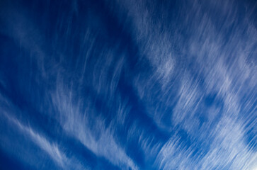 Cirrus clouds against blue sky