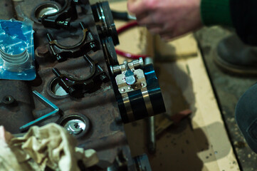 Fototapeta na wymiar engine repair assembly of pistons for a turbo engine power increase