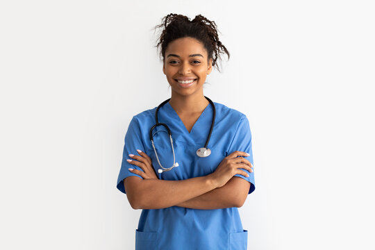 Portrait Of Black Doctor Looking At Camera With Folded Arms