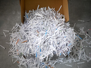 Big stack of shredded documents to protect confidential information, safety is first concept,...