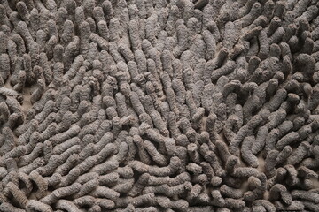 Gray foot mat worm doormat microfiber towel nano texture for background wallpaper graphic design.