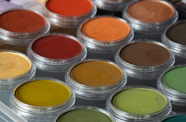 Artist is paints color pink blue purple