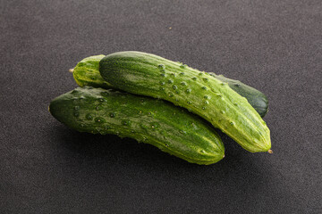 Fersh juicy green cucumbers heap