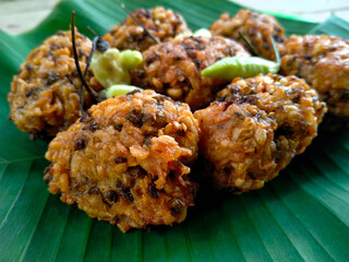 lento food from Indonesia. banana leaf background. close up shot outdoors.