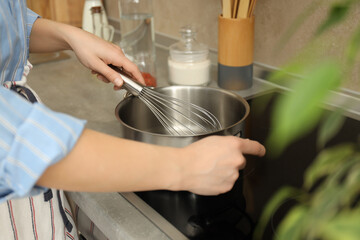 Concept of cooking with young woman, selective focus