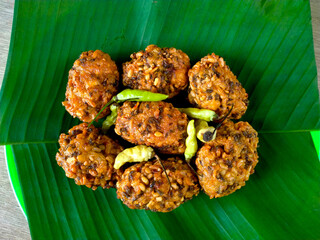 lento food from Indonesia. banana leaf background. close up shot outdoors.