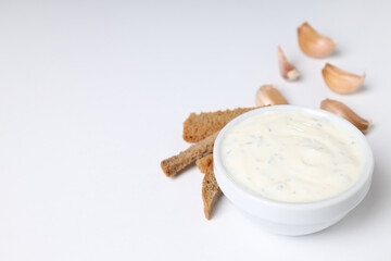 Concept of tasty food with garlic sauce, space for text